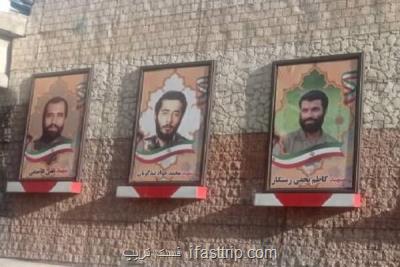 بهسازی تابلوهای مزین به تمثال شهدا در منطقه 2